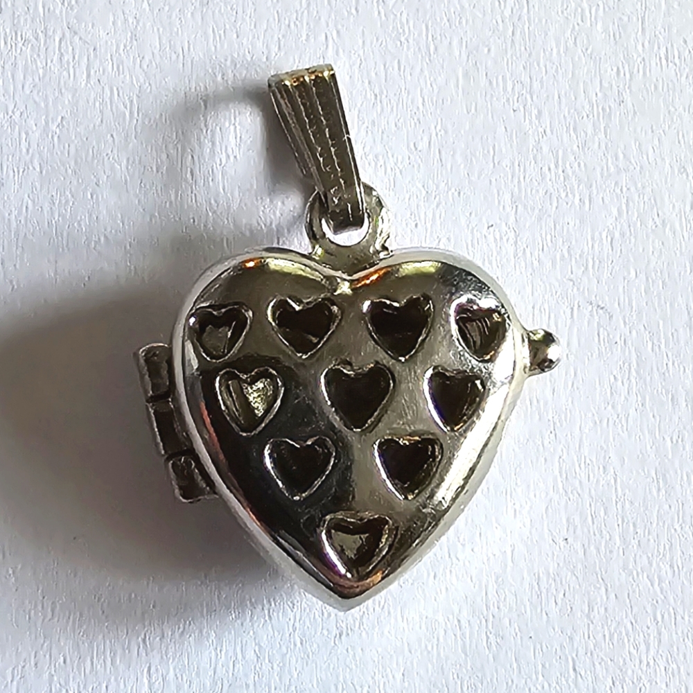 Heart locket pendant silver tone cutout scent aromatherapy charm